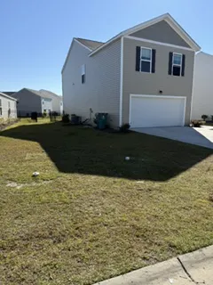 After: clean yard, junk removed by Moose